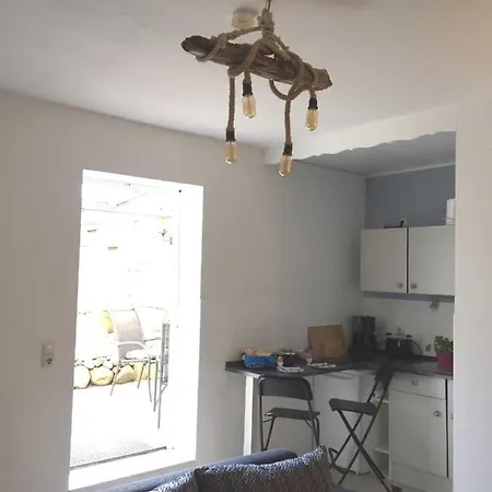 Kos-koenig, Am Sturmfeld Lejlighed